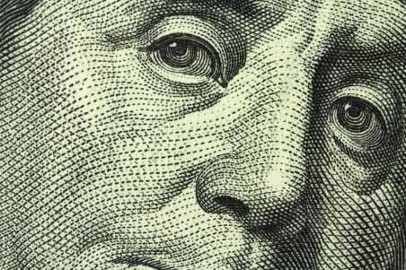 Ben Franklin face on $100 bill