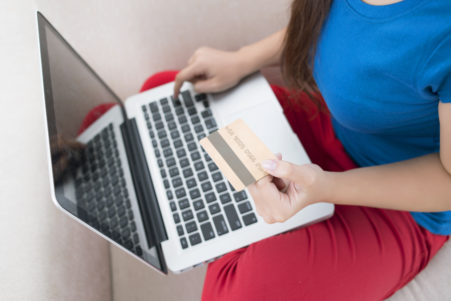 Woman holding credit card