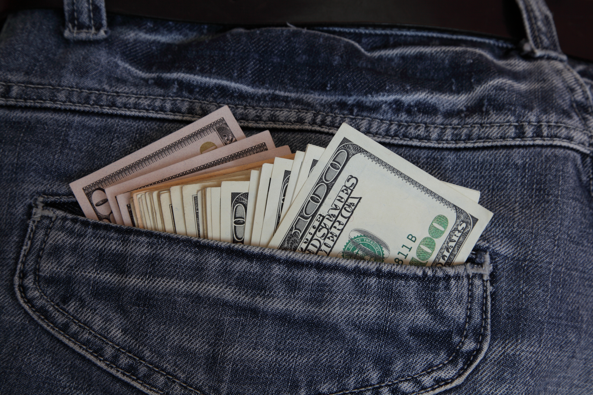 Back pocket full of $100 bills