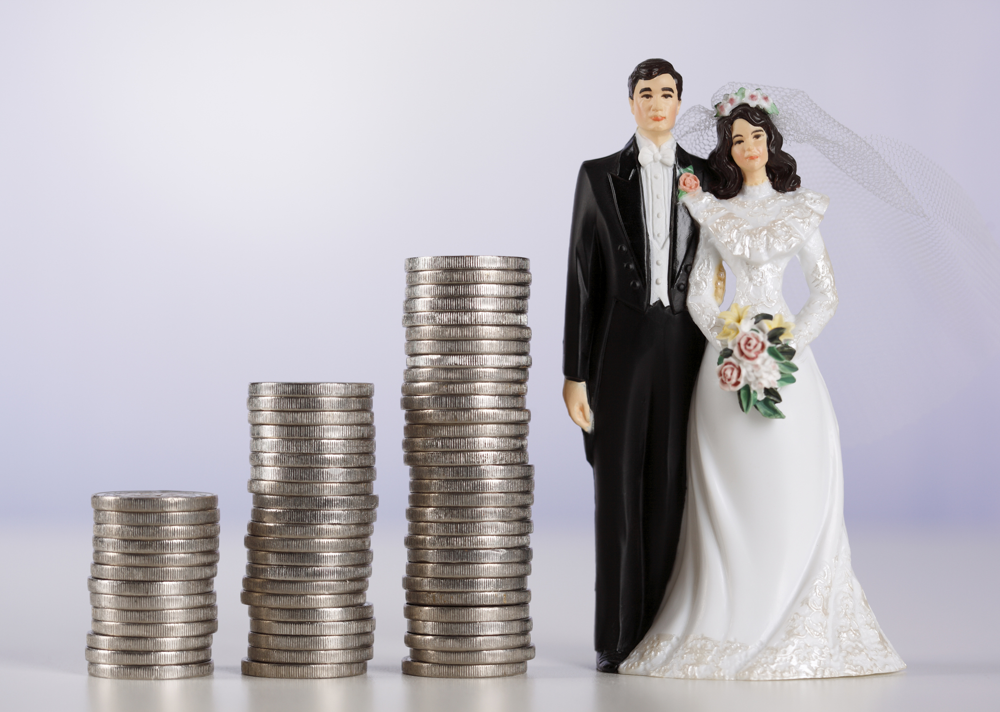 Wedding couple and coin rolls.