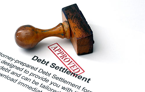 debt settlement qualification