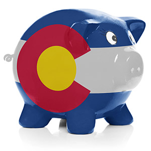 Piggy bank painted with Colorado state flag