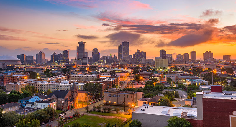 New Orleans city skyline at sunset