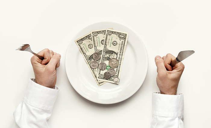 Dollars on a plate, metaphor for cash diet